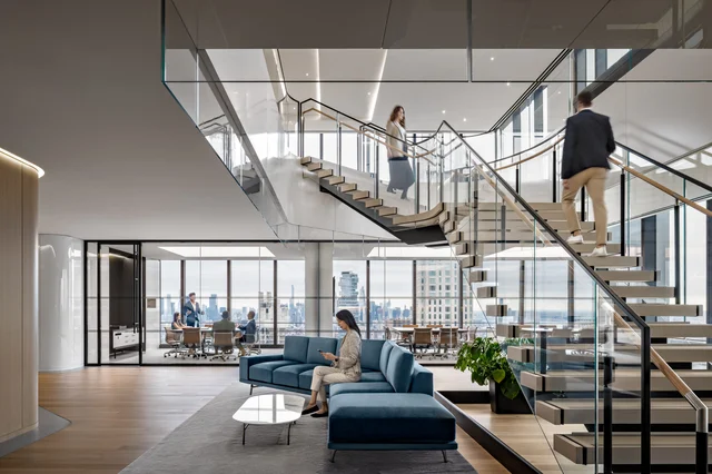 Glass Staircase Greets Visitors at Global Law Firm's Office
